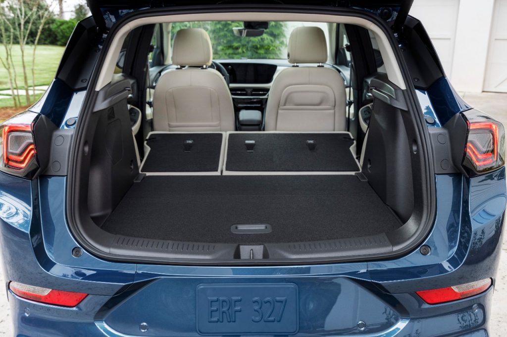 Rear view of cargo space in the 2024 Buick Encore GX Avenir in Ocean Blue Metallic.