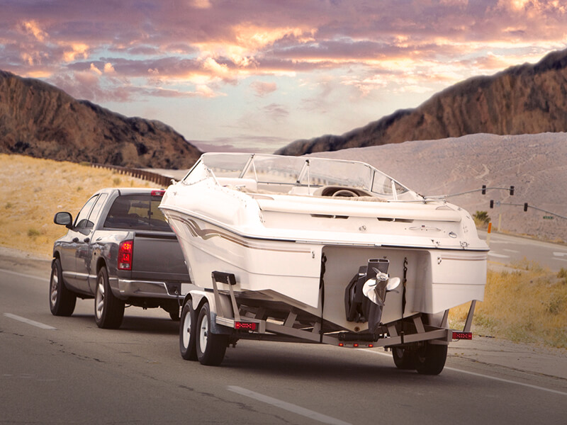GMC Truck towing a boat