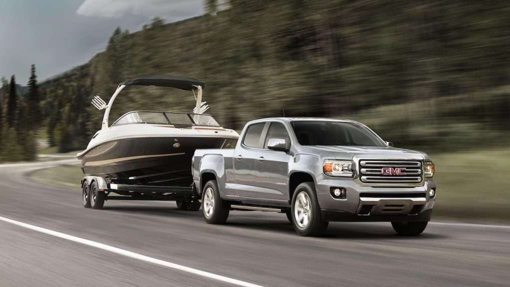 GMC Truck towing a boat