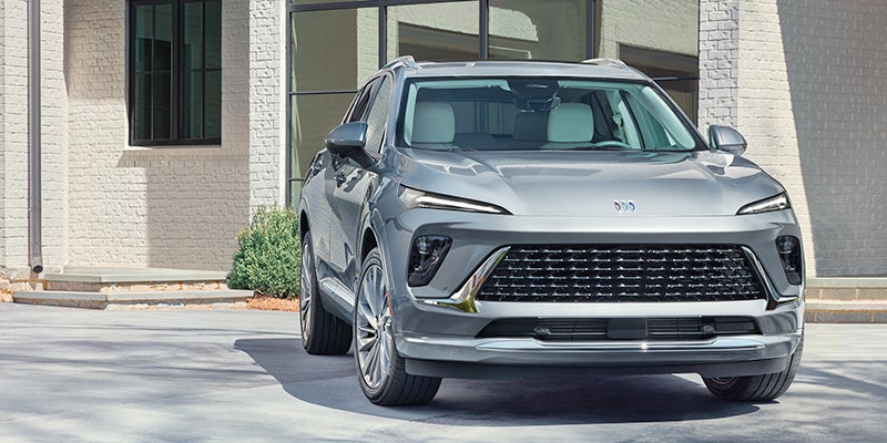 Buick Envision standing near a building